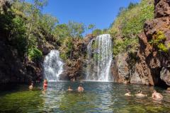 Litchfield National Park, Northern Territory, Australia - Jun 12 2013: Tourists and residents of Darwin enjoy refreshing swim at Florence Falls, very popular desitination for tourists and locals alike